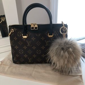 SOLD Authentic Pallas bb in 9/10 condition.